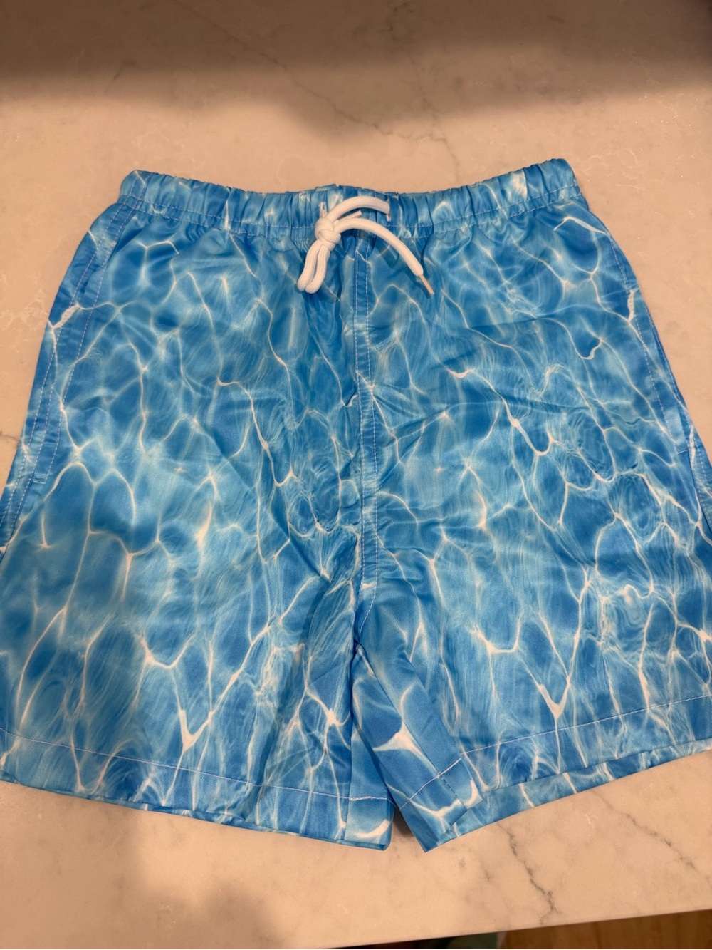 New boys sz S  Blue Water-Print Swim Trunks